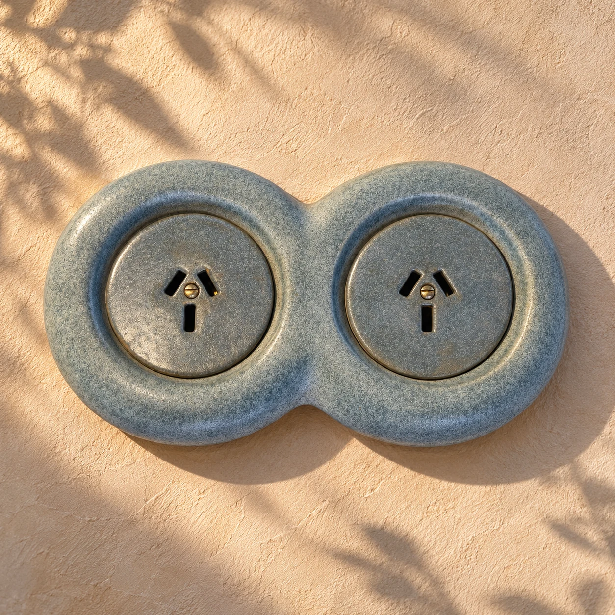 The sculptural double ceramic socket in architectural light